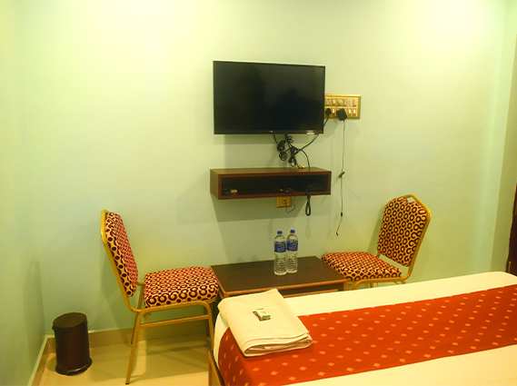 Well-maintained Standard Room with air-conditioned comfort at a lodge near Srirangam temple