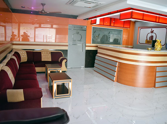 Elegant hotel reception with modern lobby and comfortable seating at a hotel near Trichy bus stand